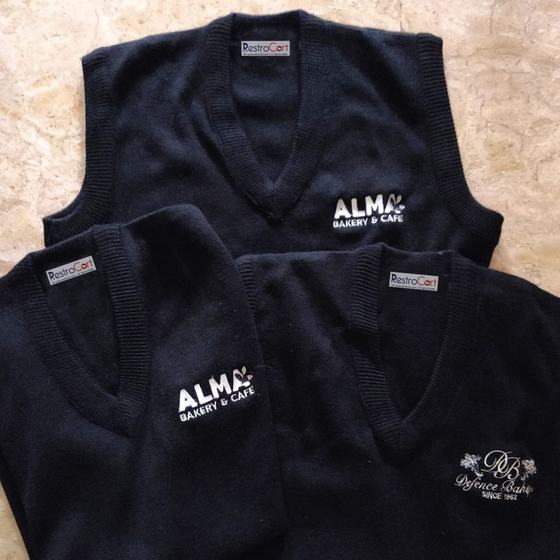 Sweaters & cardigans, custom restaurant winterwear made for Alma at Defence Bakery by RestroCart, New Delhi