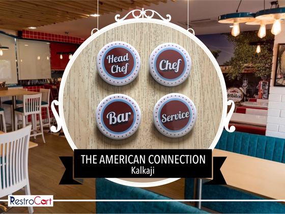 Four round red and white button badges printed Head Chef, Chef, Bar and Service, custom made for American Connection by RestroCart, New Delhi