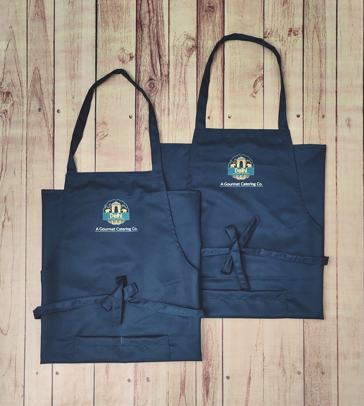 Custom restaurant aprons and uniforms folded for dispatch, RestroCart New Delhi