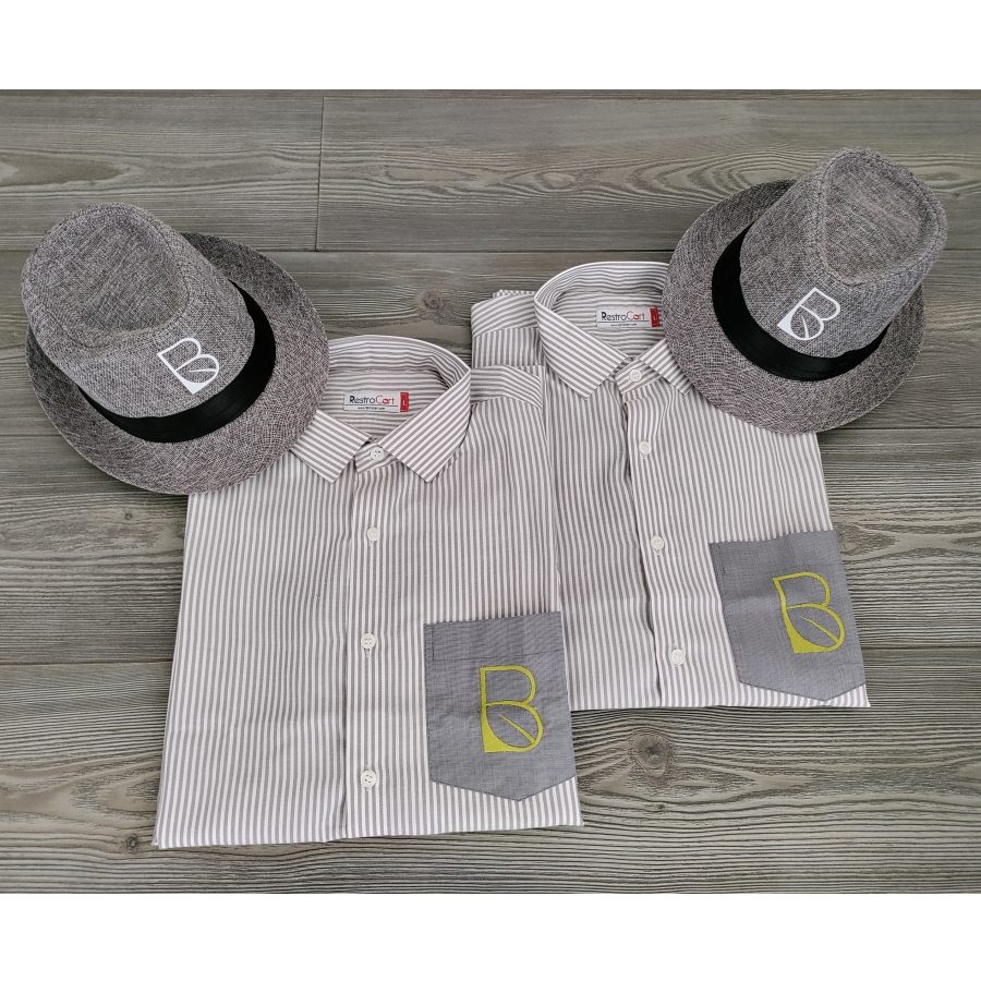 Custom steward and server uniforms with shirts and aprons made for Bayleaf restaurant by RestroCart