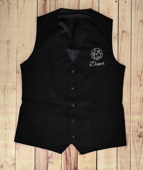 Black waistcoat with patterned lining and white embroidered cafe logo, laid flat, custom made by RestroCart, New Delhi