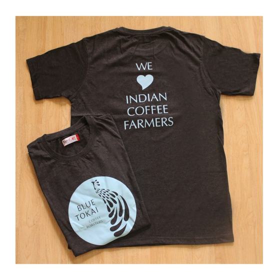 Charcoal T-shirts with white slogan print on back and round peacock logo, custom made for Blue Tokai Coffee Roasters by RestroCart, New Delhi