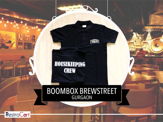 Black polo t-shirts with Housekeeping Crew printed on the back and small chest logo, custom made for Boombox Brewstreet by RestroCart, New Delhi