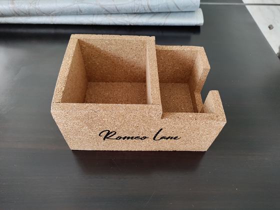 Cork cutlery and napkin caddy with two compartments and black printed script name, side angle, custom made by RestroCart, New Delhi