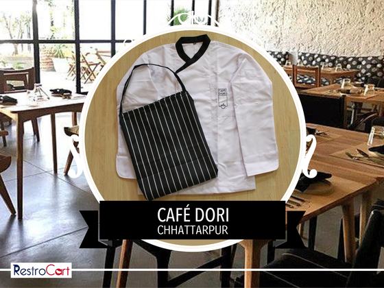 White chef coat with black crossover collar and black and white striped bib apron, laid flat, custom made for Cafe Dori by RestroCart, New Delhi