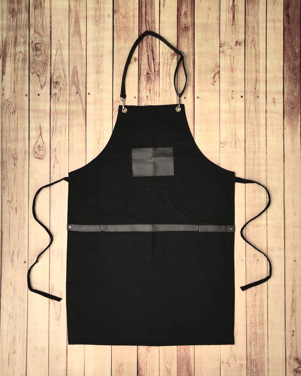 Custom cotton canvas aprons with leatherette belts and brass eyelets, restaurant aprons made by RestroCart