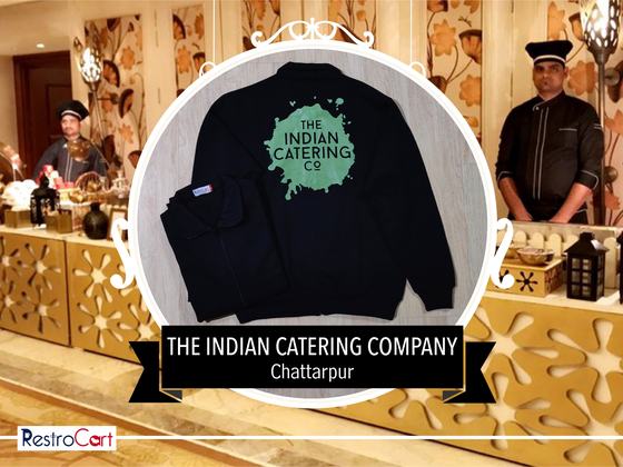 Black zip jacket with large green splash logo print on the back, laid flat with a second, custom made by RestroCart, New Delhi