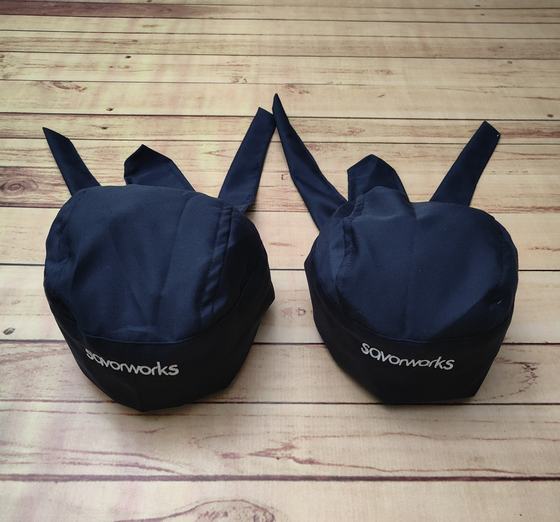 Navy chef skull caps with long back ties and white printed lowercase wordmark, custom made by RestroCart, New Delhi