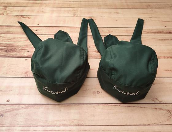 Dark green chef skull caps with back ties and white printed script name on the band, custom made by RestroCart, New Delhi