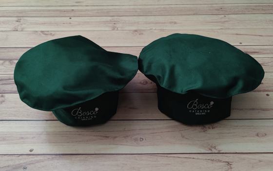 Bottle green mushroom-top chef caps with black band and white printed logo, custom made by RestroCart, New Delhi