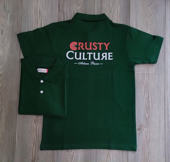 Bottle green polo t-shirts with large red and white logo printed across the back, custom made for Crusty Culture by RestroCart, New Delhi