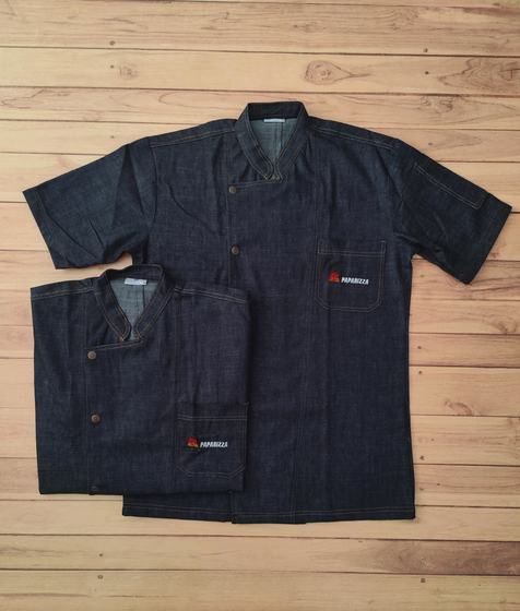 Dark denim half sleeve chef coats with contrast stitching and red chest logo, one folded, one flat, custom made by RestroCart, New Delhi