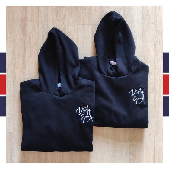Two black hoodies with white embroidered script logo on chest, folded, custom made for Dirty Good by RestroCart, New Delhi