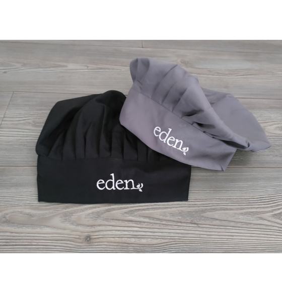 Black and grey pleated chef toques with white embroidered script logo, custom made for Eden by RestroCart, New Delhi