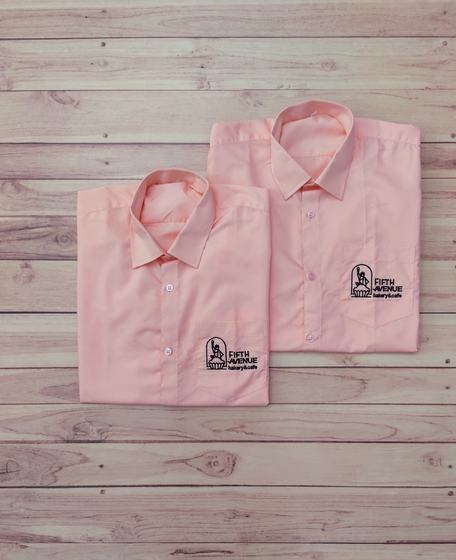 Peach pink formal uniform shirts with black embroidered pocket logo, folded pair, custom made for Fifth Avenue Bakery by RestroCart, New Delhi