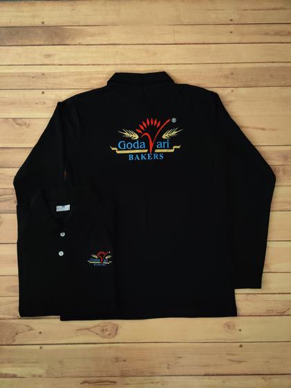 Black full-sleeve collared tops with large multicolour embroidered bakery logo on the back, folded pair, custom made by RestroCart, New Delhi