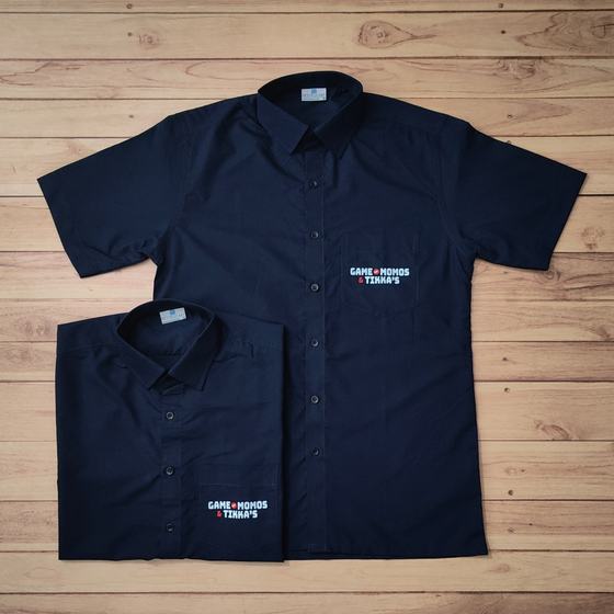 Navy half sleeve shirts with white and red embroidered chest logo, two sizes, custom made for Game of Momos by RestroCart, New Delhi