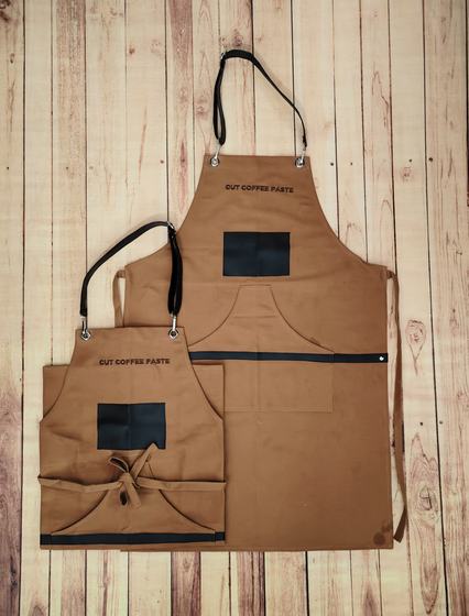 Brown canvas apron pair with black straps, black leatherette pocket patches and printed text, custom made by RestroCart, New Delhi