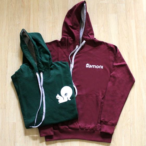 Maroon hoodie with white chest logo and bottle green hoodie with white squirrel print, custom made for Hamoni Cafe by RestroCart, New Delhi