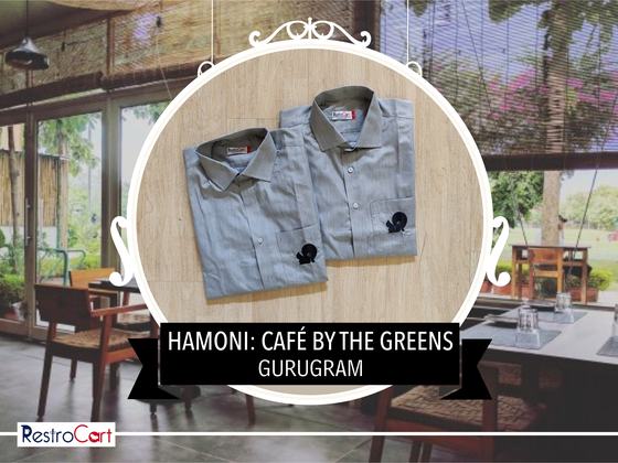 Grey service shirts with an embroidered logo, custom uniform shirts made for Hamoni Cafe, Gurugram, by RestroCart