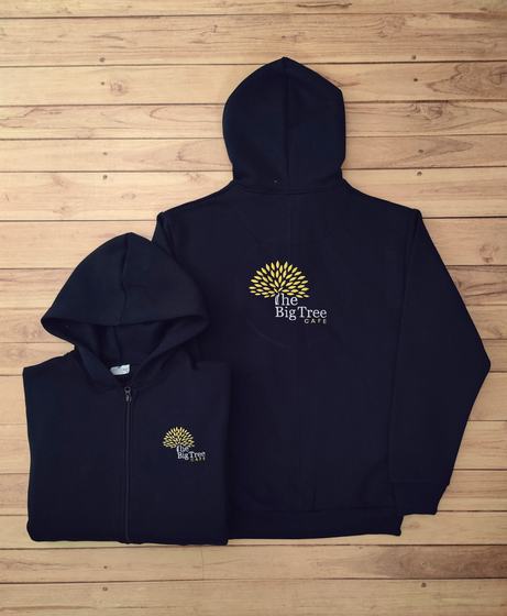 Navy zip hoodies with gold and white embroidered tree logo on back and chest, one folded, custom made by RestroCart, New Delhi