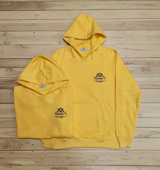 Mustard yellow pullover hoodies with black printed logo on the chest and front pouch pocket, custom made by RestroCart, New Delhi
