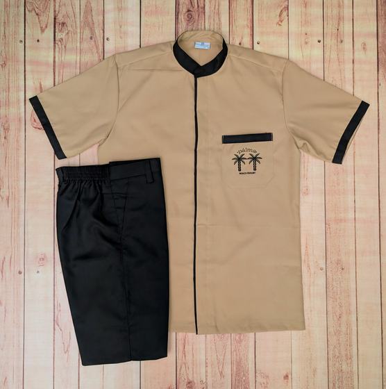 Beige short-sleeve housekeeping tunic with black collar, piping and palm logo, with black trousers, custom made by RestroCart, New Delhi