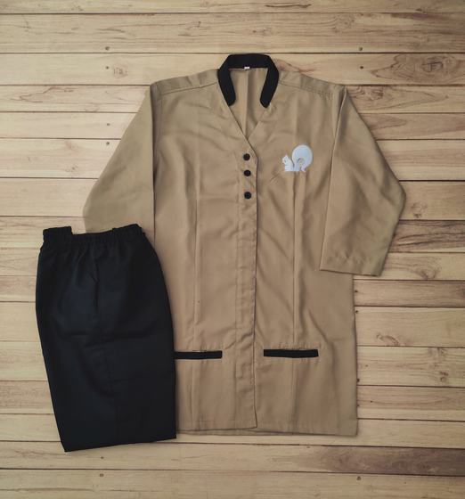 Khaki long tunic with black collar and pocket trim, white squirrel logo and black trousers, custom made by RestroCart, New Delhi