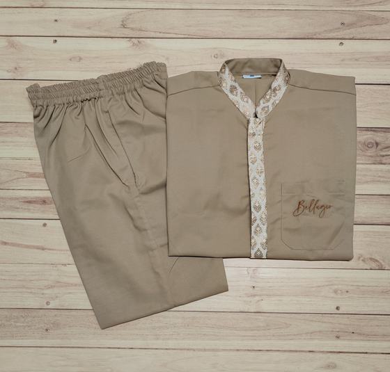 Beige housekeeping tunic with patterned placket, embroidered script logo and elastic waist trousers, custom made by RestroCart, New Delhi