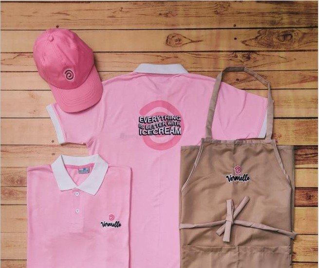 Pink polos, cap and khaki aprons for an ice cream parlour