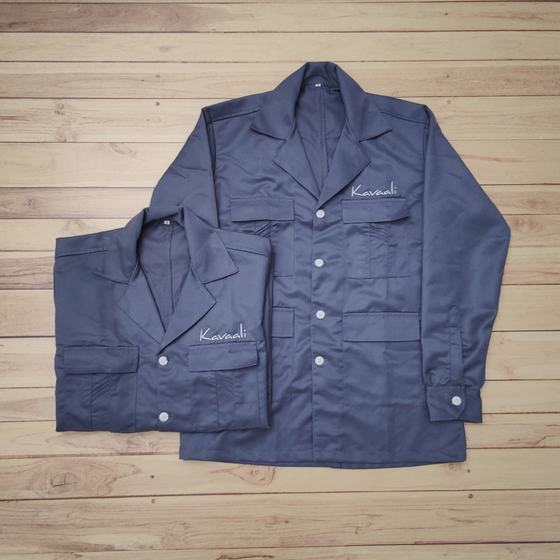 Two grey long sleeve safari shirts with notched collar, flap pockets and embroidered script logo, custom made for Kavaali by RestroCart, New Delhi