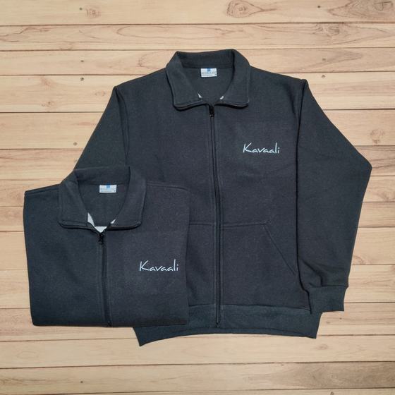 Two charcoal fleece zip jackets with high collar and embroidered script logo on chest, laid flat, custom made for Kavaali by RestroCart, New Delhi