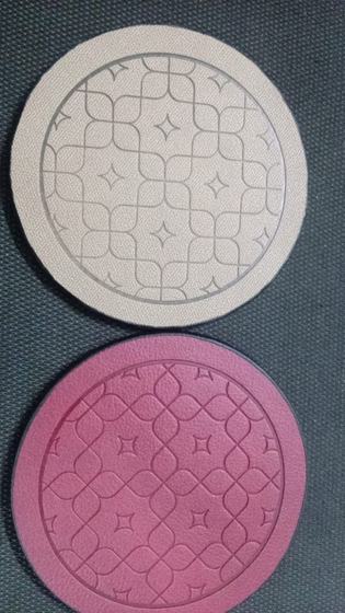 Round leatherette coasters in beige and plum with embossed geometric tile pattern, custom made by RestroCart, New Delhi