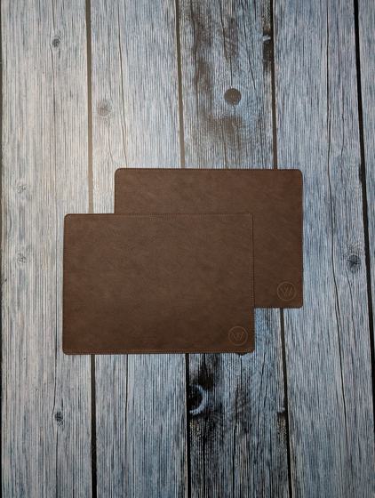 Brown leatherette table mats with rounded corners and small debossed corner logo, custom made by RestroCart, New Delhi