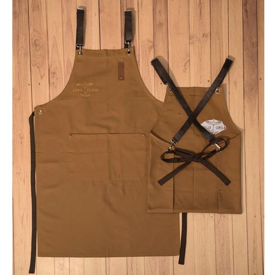 Tan canvas bib aprons with dark leather cross back straps and printed logo, full and child size, custom made for Lord Elgin by RestroCart, New Delhi