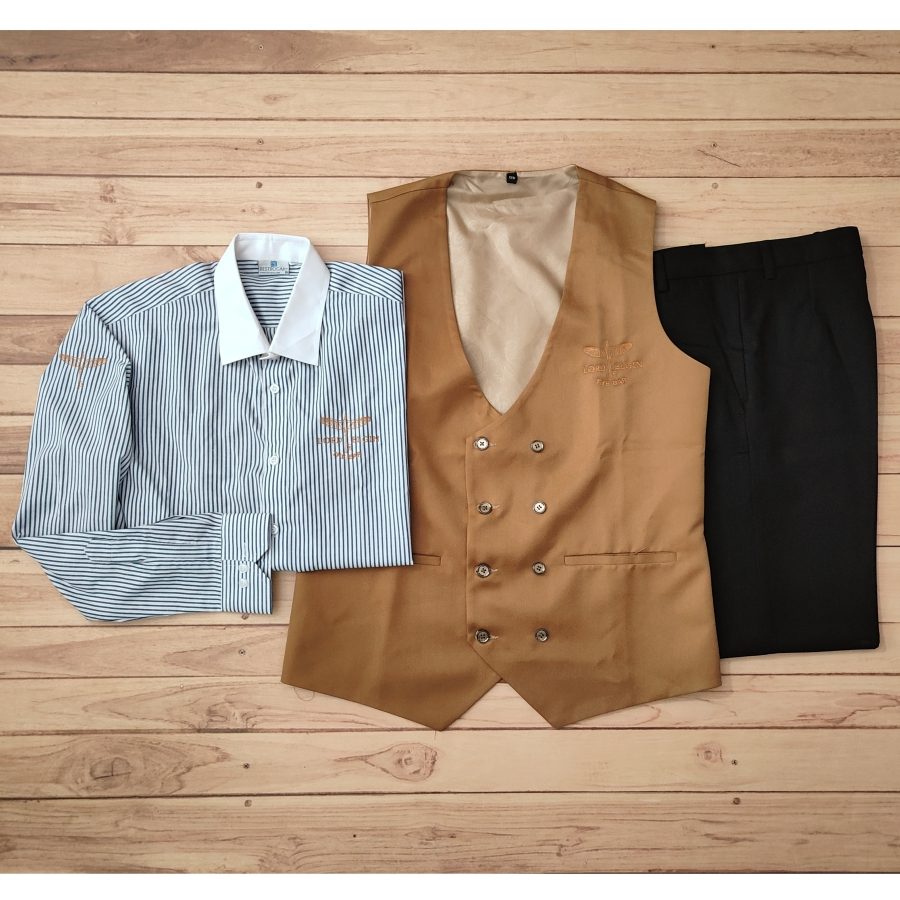 Fine-dining service uniform with a blue striped shirt, a tan double-breasted waistcoat and black trousers, made for Lord Elgin by RestroCart