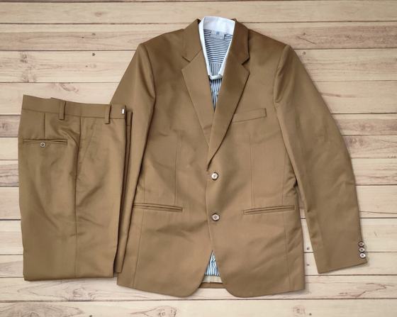 Tan brown two button blazer with matching trousers over blue striped shirt, laid flat, custom made by RestroCart, New Delhi
