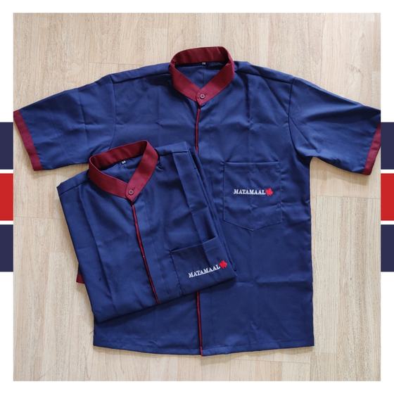 Two navy half sleeve housekeeping tunics with maroon collar and sleeve trim, pocket logo, custom made for Matamaal by RestroCart, New Delhi