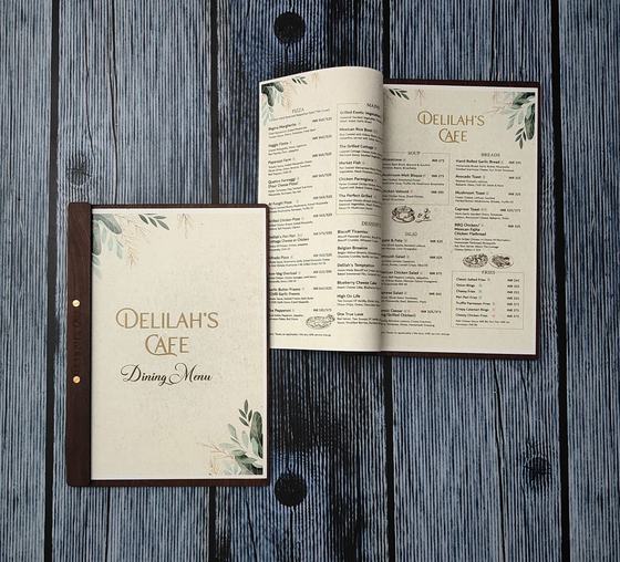 Dark wood MDF menu board with cream printed dining menu cover and an open multi-page menu, custom made by RestroCart, New Delhi