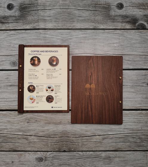 Dark wood MDF menu boards, one with printed coffee menu and one with engraved leaf logo, custom made by RestroCart, New Delhi