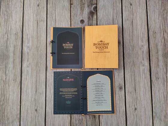 Ring bound menus with wood finish covers, printed title and dark arched inner pages, open and closed, custom made by RestroCart, New Delhi