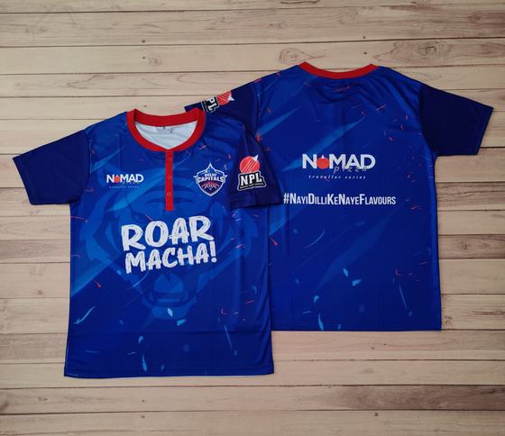 Royal blue sublimated sports jerseys with red collar, bold slogan and team print, custom made for NOMAD Pizza by RestroCart, New Delhi