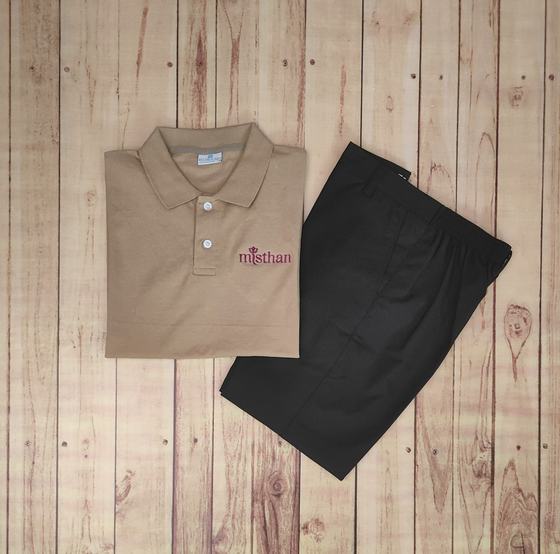 Beige polo t-shirt with maroon embroidered script logo, folded with black service trousers, custom made by RestroCart, New Delhi