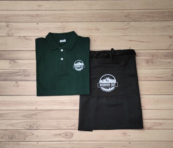 Bottle green polo t-shirt with white round logo and black waist apron with large printed logo, custom made by RestroCart, New Delhi