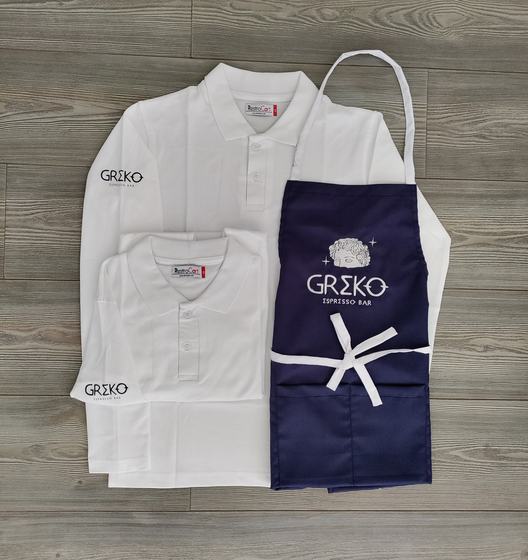 White full-sleeve and half-sleeve polo t-shirts with sleeve logo beside a navy bib apron with ties, custom made by RestroCart, New Delhi