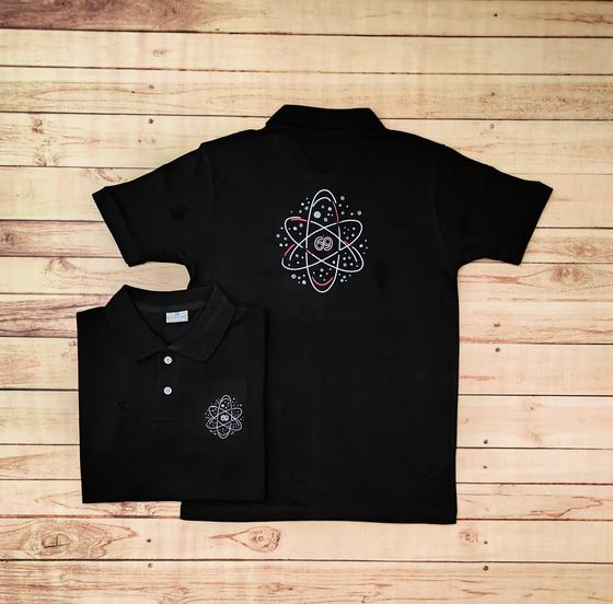 Black polo t-shirts with white printed atom emblem, large on the back and small on the chest, custom made by RestroCart, New Delhi