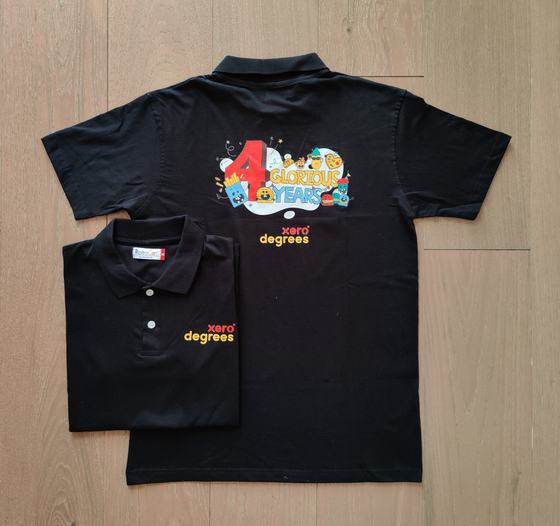 Black polo t-shirts with colourful anniversary print on back and yellow chest logo, front and back view, custom made by RestroCart, New Delhi