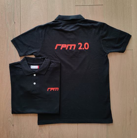 Black polo t-shirts with red printed logo on back and chest, one folded over the other, custom made by RestroCart, New Delhi