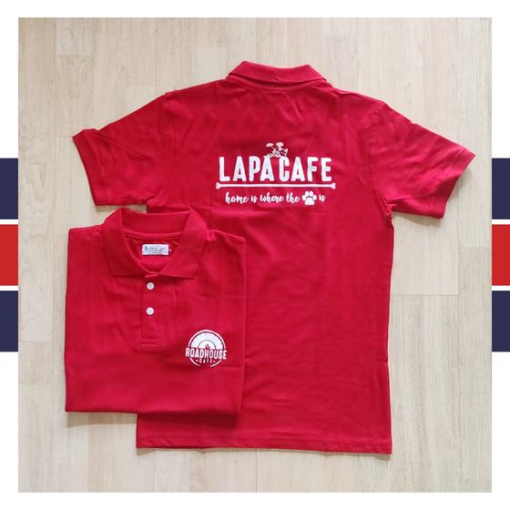 Red polo T-shirts with white printed text and logo on back and sleeve logo, one folded, custom made for Roadhouse Cafe by RestroCart, New Delhi