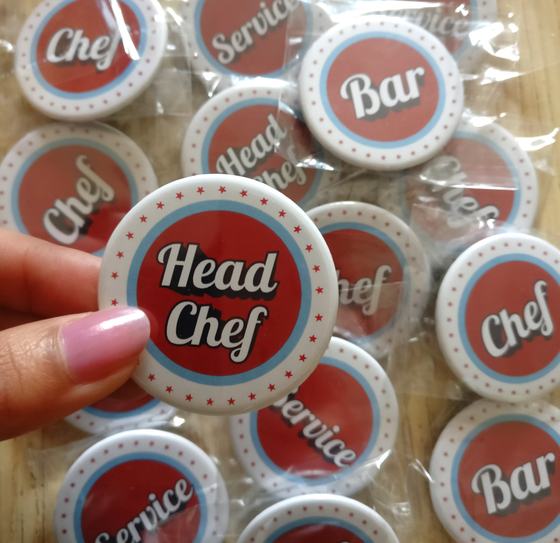 Round button badges printed Head Chef, Chef, Bar and Service, retro red and blue design, custom made by RestroCart, New Delhi